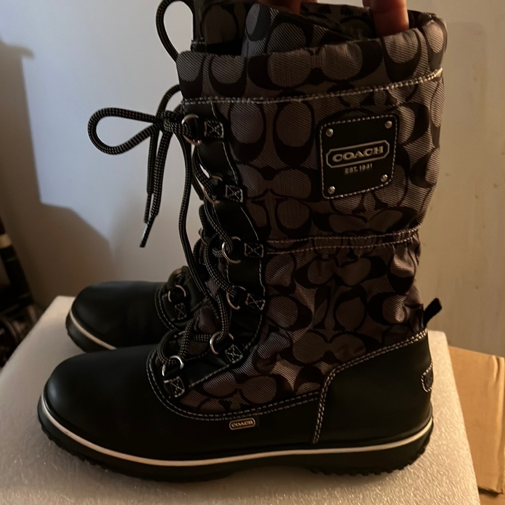 COACH BOOTS SIZE 8 women’s pre worn twice with a small scratch on the right boot